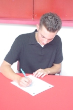 Utica's Mike Music signs